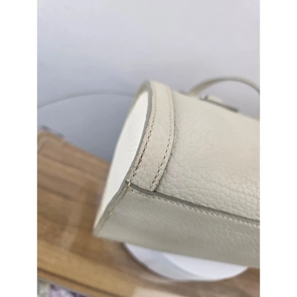 Dooney & Bourke Cream Pebbled Leather‎ Barrel Shoulder Bag Marbled Lining